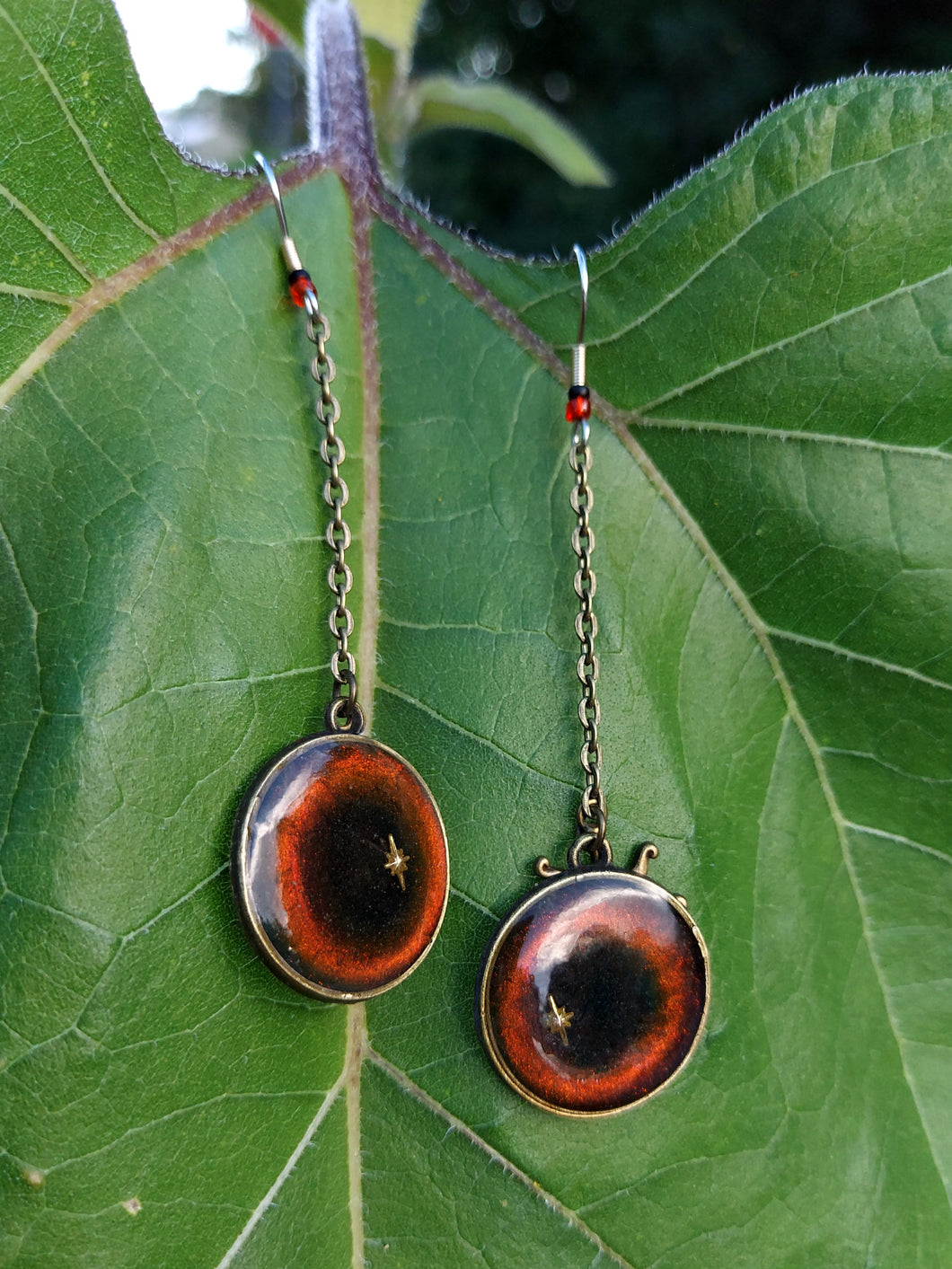 Orange Black Hole Starburst Earrings