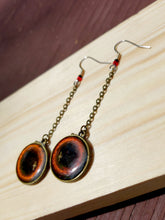 Load image into Gallery viewer, Orange Black Hole Starburst Earrings
